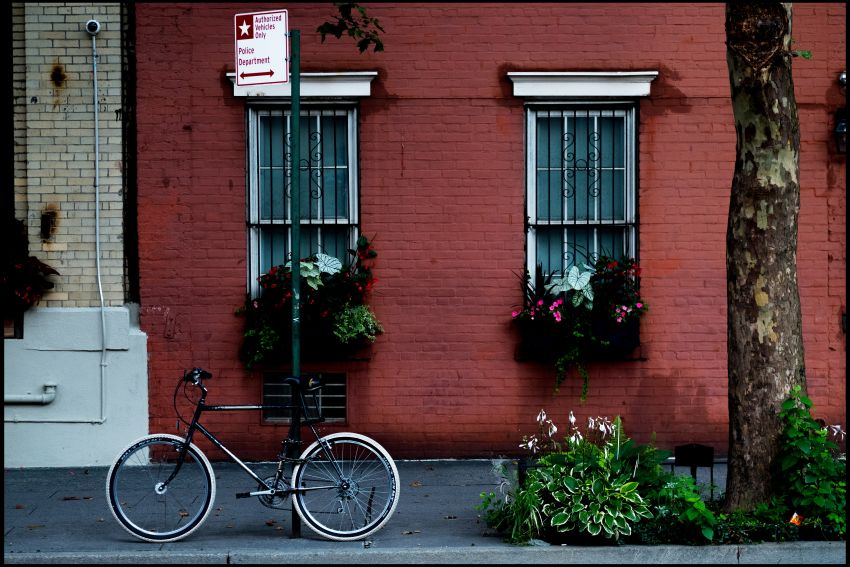 bike parked outside of a greenwhich village apartment building 