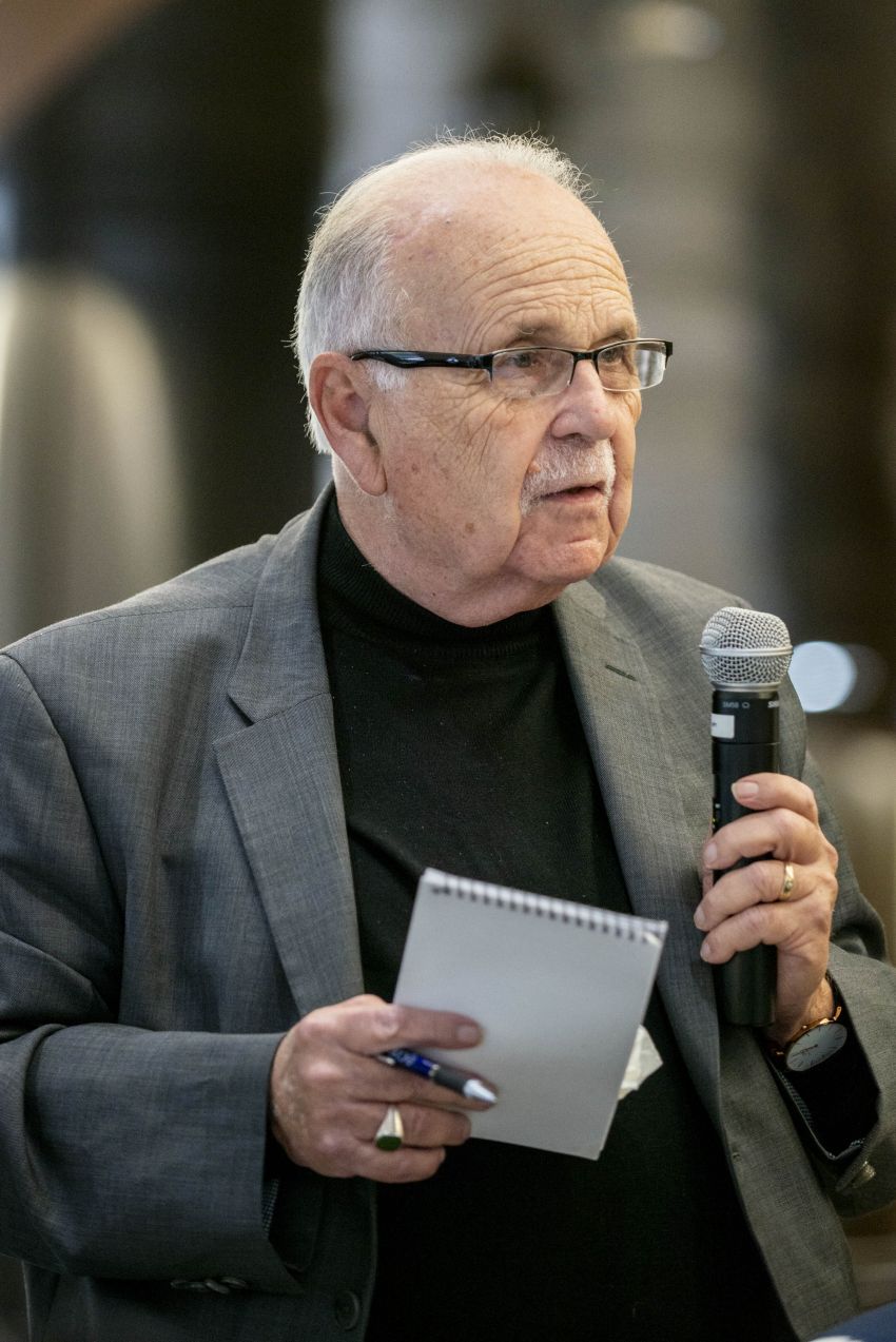 Stanley Fish asks a question during the keynote address.