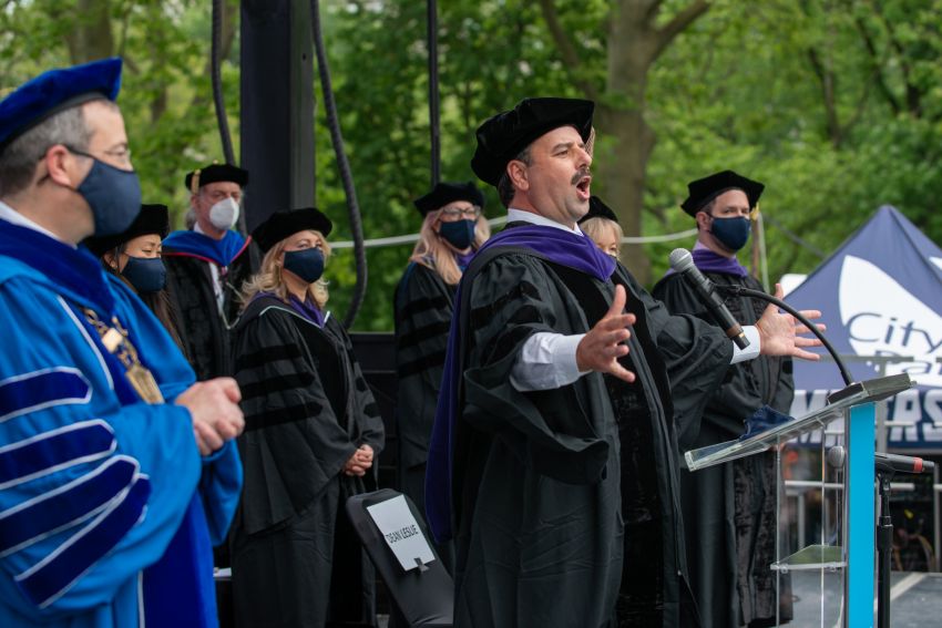Professor Buccafusco speaking at a podium 