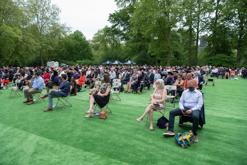 guests seated at commencement 2021