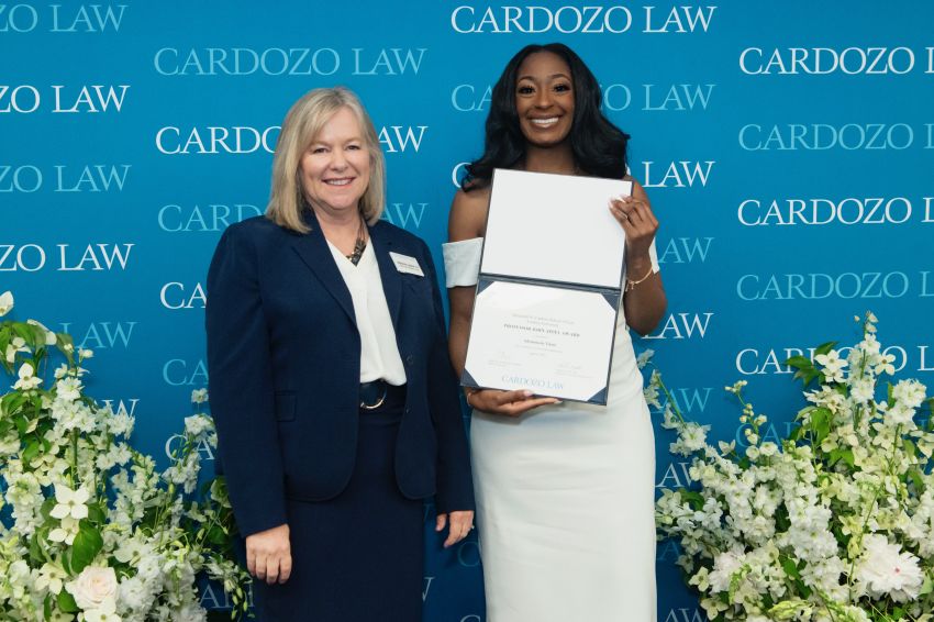 student with award and melanie leslie