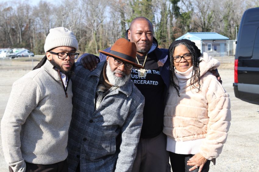 LaShawn Fitch with family and Derrick Hamilton